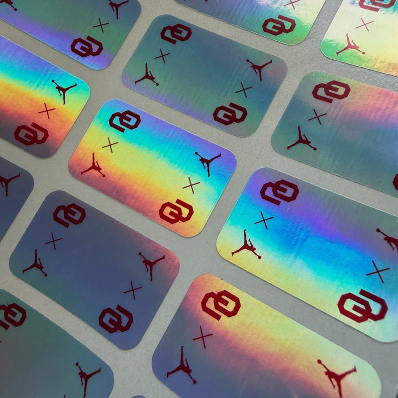 Sheet of custom Silver Holo Mag Seals with red logos